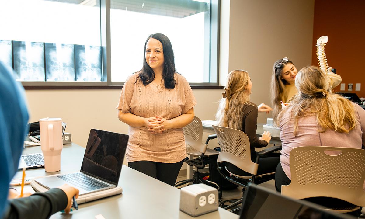 Sara Rivard in a radiology classroom with students working