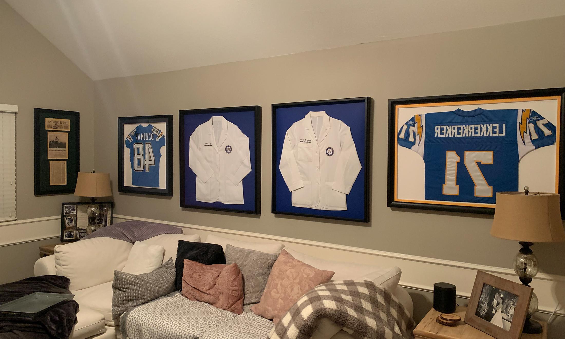 An image of NFL jerseys and OUWB white coats