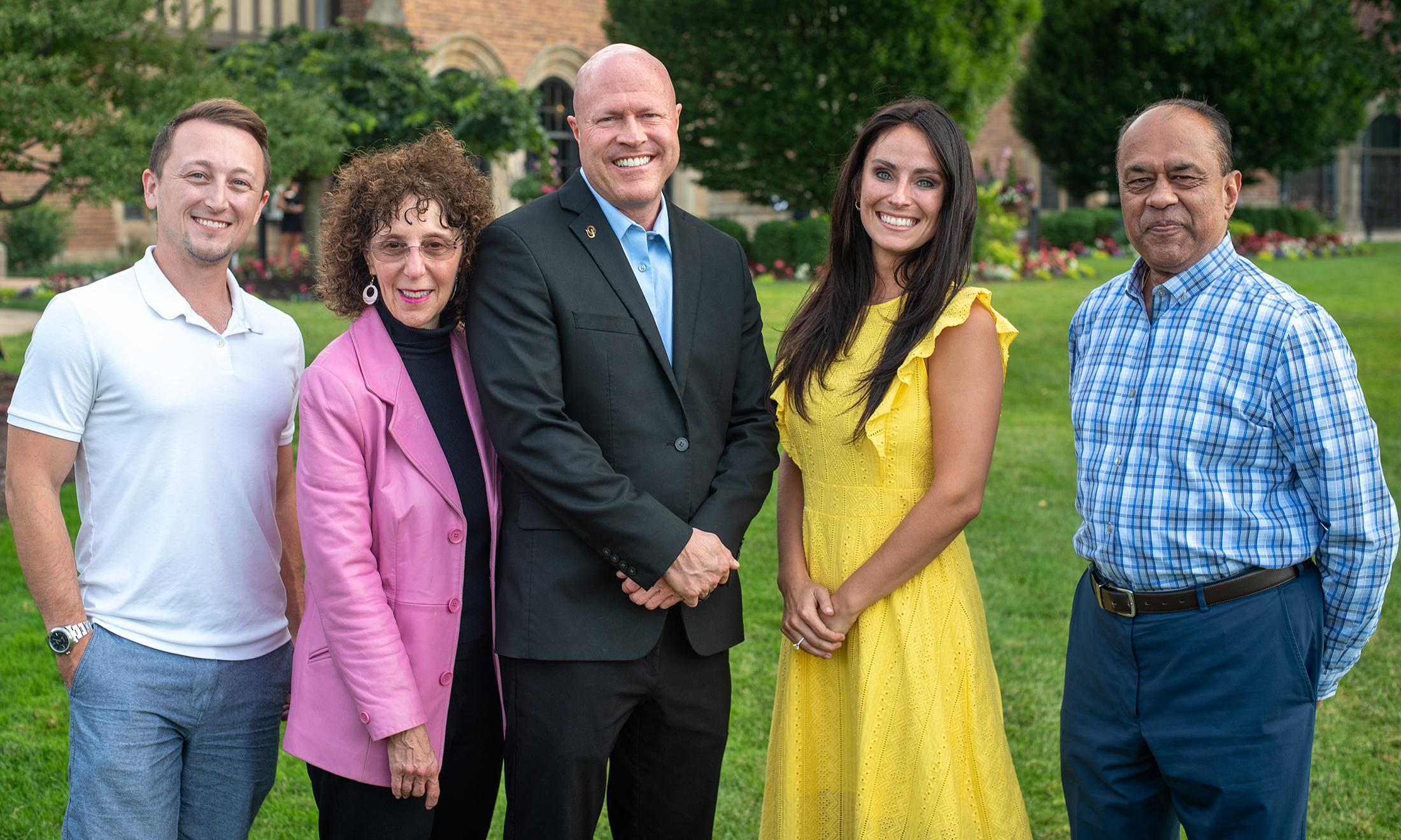 Five people posing