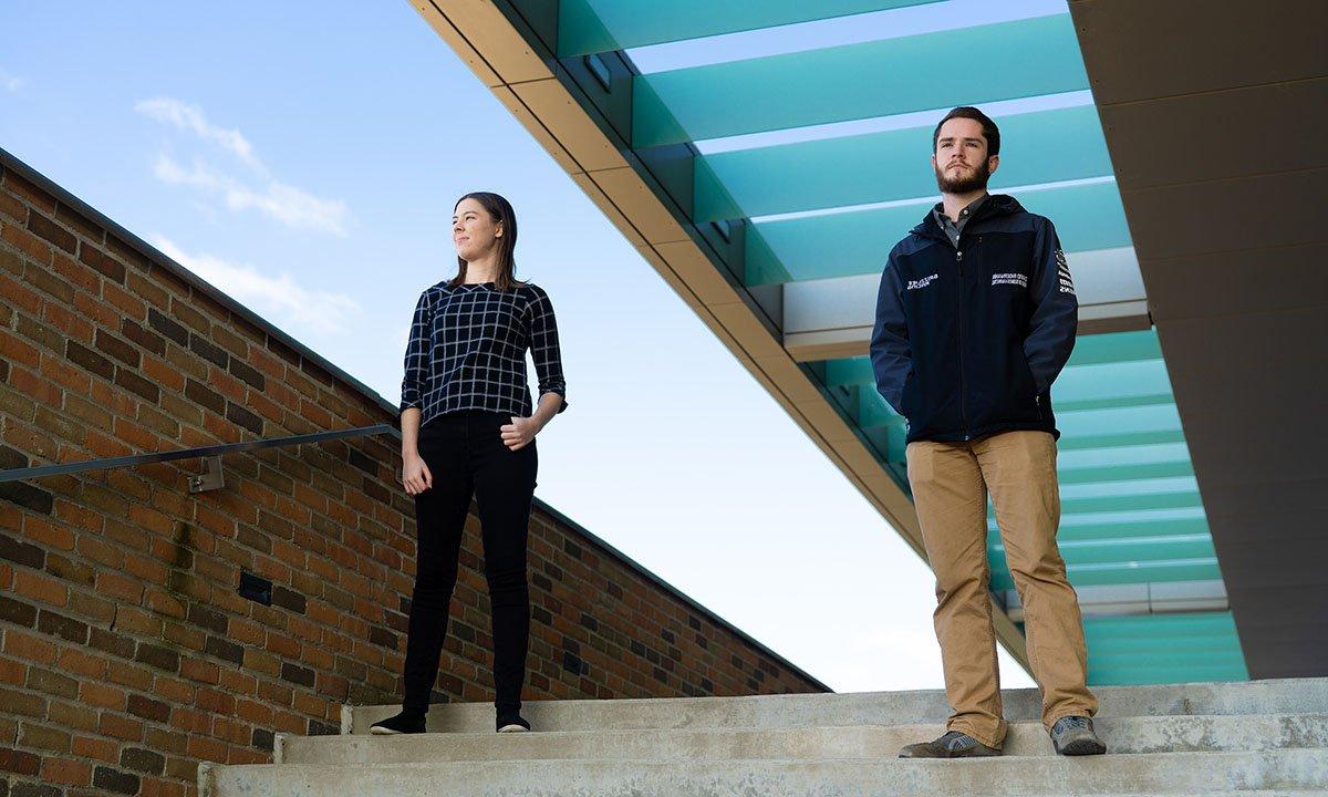 Two students standing outside Engineering Building