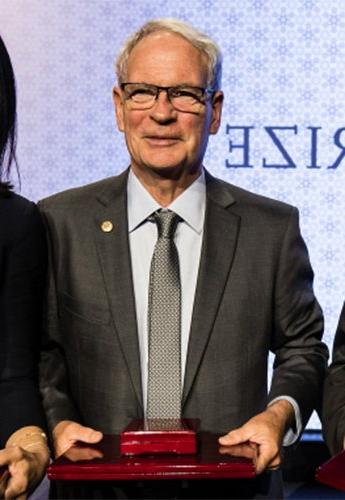 Harry Orr with his award